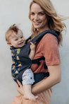 Our streamlined soft structured baby carrier is designed to go and grow with your little one. This ergonomic front facing baby carrier is ready to use from infant to toddler.